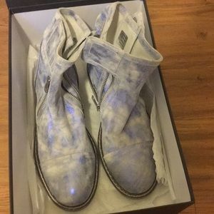 A never worn before pair of Now boots .